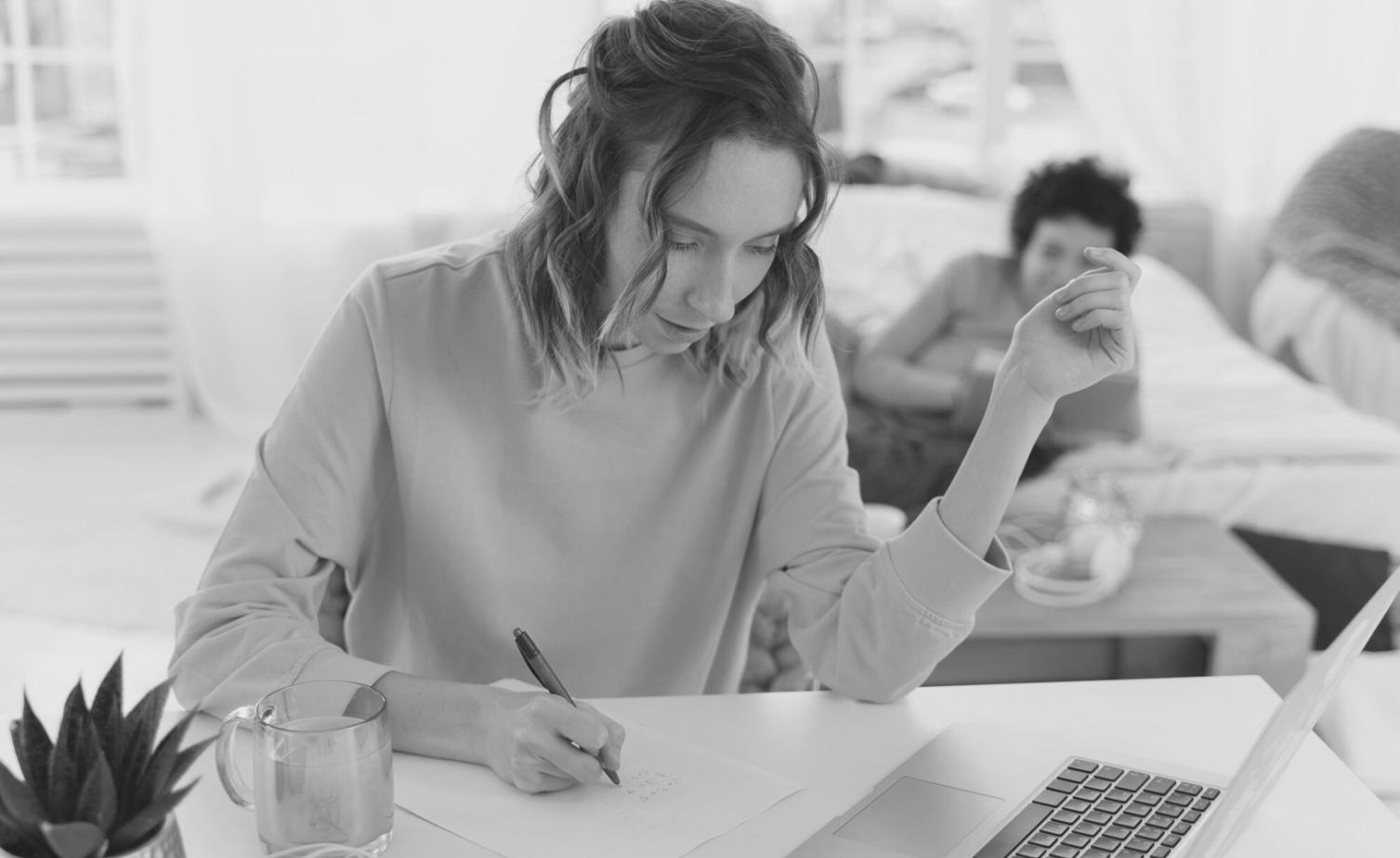 Financial professionals reviewing seasonal budget frameworks and market analysis documents during strategic planning meeting